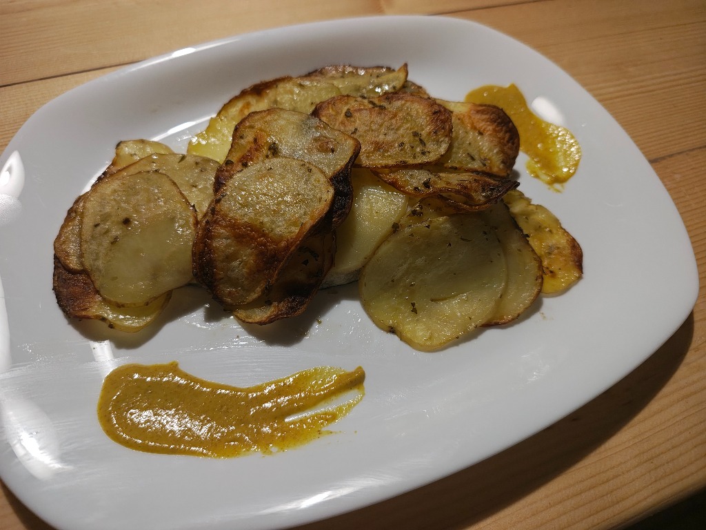 Filetto di pesce in crosta di patate dorate